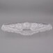 A clear crystal plastic Fineline gondola bowl with a design on it.