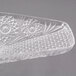 A clear plastic tray with a design on it.