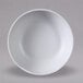 A speckled white Elite Global Solutions melamine bowl.