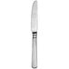 A close-up of a Walco stainless steel dinner knife with a long handle.