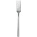 A close-up of a Walco stainless steel salad fork with a fieldstone finish. The fork has a silver handle.