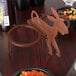 A brown polypropylene Paulie Jose salsa caddy on a table.