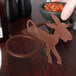 A brown polypropylene HS Inc. salsa caddy with a cartoon donkey on it.