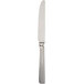 A close-up of a Walco stainless steel table knife with a long silver handle.