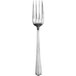 A silver Walco Hyannis salad fork with a white background.