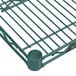 A Metroseal 3 wire shelf with green metal bars.