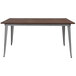 A Flash Furniture rectangular dining table with a rustic walnut wood top and silver metal legs.