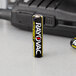 A Rayovac Ultra Pro AAA battery on a table.