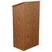 A wooden podium with a medium oak finish and a wooden top.