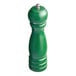 An Acopa matte green wooden pepper mill.