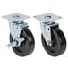 A pair of Vulcan swivel plate casters with black rubber wheels.