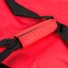 A red and black Rubbermaid insulated delivery bag with a zipper.