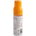 A can of Vegalene Non-GMO Food Release Spray with an orange label.
