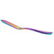 a rainbow colored spoon on a white background