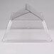 A clear plastic pyramid-shaped sneeze guard with a roof on top for a Star Grill Max roller grill.