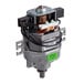 A motor with wires and a green sticker.