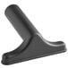 A black plastic Lavex upholstery tool for a vacuum cleaner.