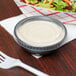 a spoon and a bowl on a table