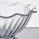 a clear glass bowl with wavy edge