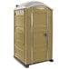 A tan PolyJohn portable toilet.