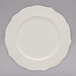A close up of a white 10 Strawberry Street Dahlia side plate with a design on it.