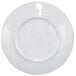 An Elite Global Solutions taupe melamine plate with a circular edge.