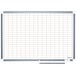 A MasterVision white board with a grid on it.