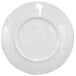 An Elite Global Solutions round white melamine plate with a circular edge.