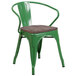 A green Flash Furniture metal restaurant chair with a wooden seat.
