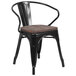 A black metal Flash Furniture restaurant chair with a wooden seat and vertical slat back.