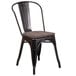 A Flash Furniture black metal restaurant chair with a wood seat.