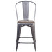A Flash Furniture metal counter height stool with a square wood seat.