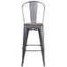 A Flash Furniture metal bar stool with a square wood seat.