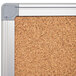 A MasterVision cork board with an aluminum frame and gray corners.