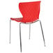 a red chair with metal legs