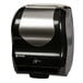 A black and stainless steel San Jamar paper towel dispenser.