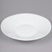 A white plate with a shiny surface.