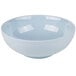 A light blue melamine bowl with a white rim.