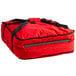 a red bag with black straps