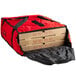 A red Cambro Pizza Delivery GoBag with two pizza boxes inside.