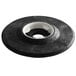A black round pad driver with a white circle.