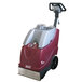 A red and white Minuteman X17 carpet extractor with wheels and a handle.