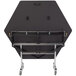 A black hexagonal table with wheels.