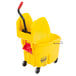 A yellow Rubbermaid mop bucket with a handle.