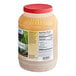 A plastic container of AAK Select Recipe Traditional Italian Dressing with a label.