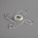 A white circular plastic ring with a hole in the middle.
