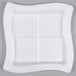 A white square Fineline disposable plastic tray with four sections.