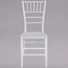 A white Flash Furniture Hercules Series Chiavari chair.