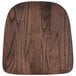 A rustic walnut wood chair seat.