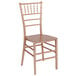 A Flash Furniture rose gold chiavari chair.